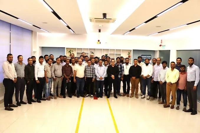 Participants and facilitators together after a leadership training session
