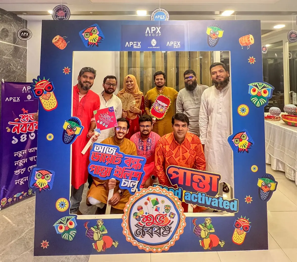 The team in traditional dress at the office Pohela Boishakh celebration